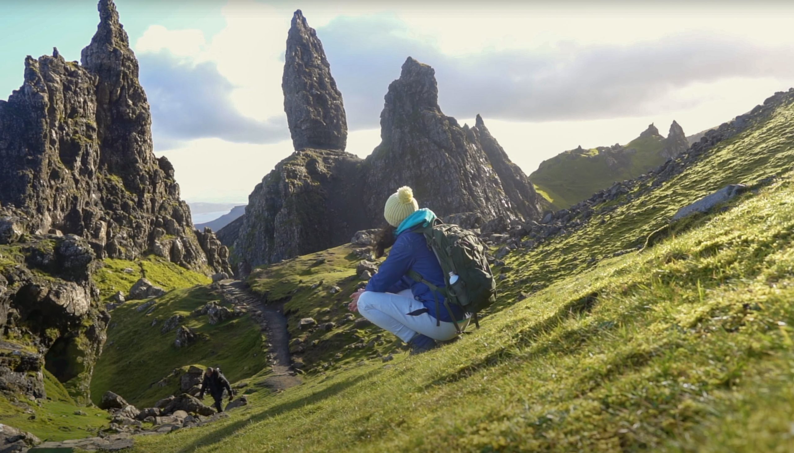 A girl hiking at the Old Man of Storr on the Isle of skye