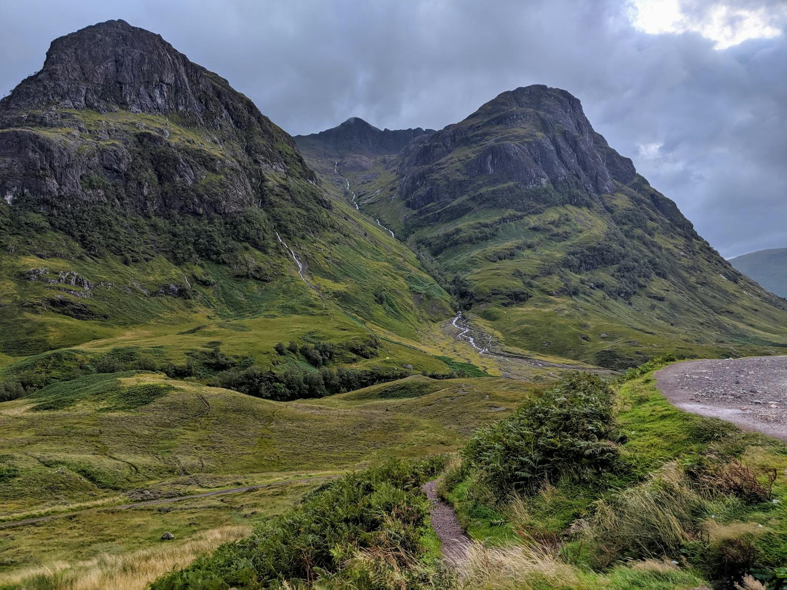 Explore the lush highlands of Altnafeadh, Scotland with dramatic mountains and verdant trails.