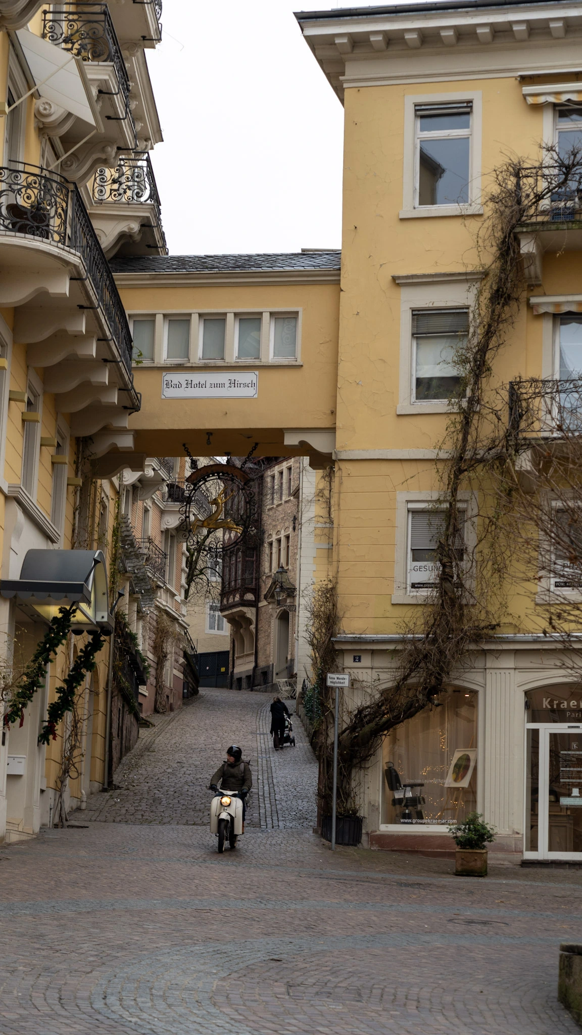 baden baden's old town with a scooter driving through